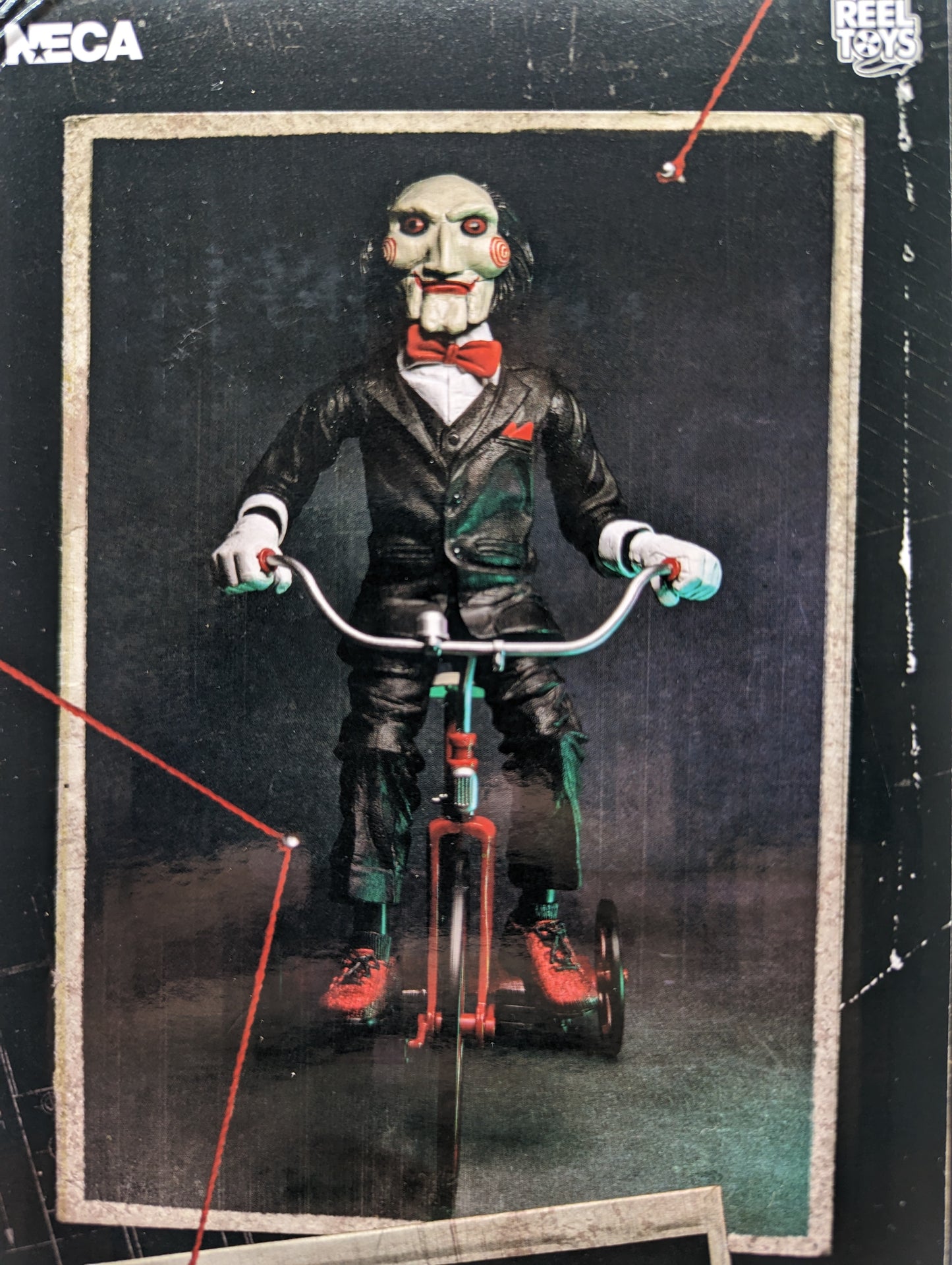 NECA - SAW Billy The Puppet with Tricycle 12 inches.