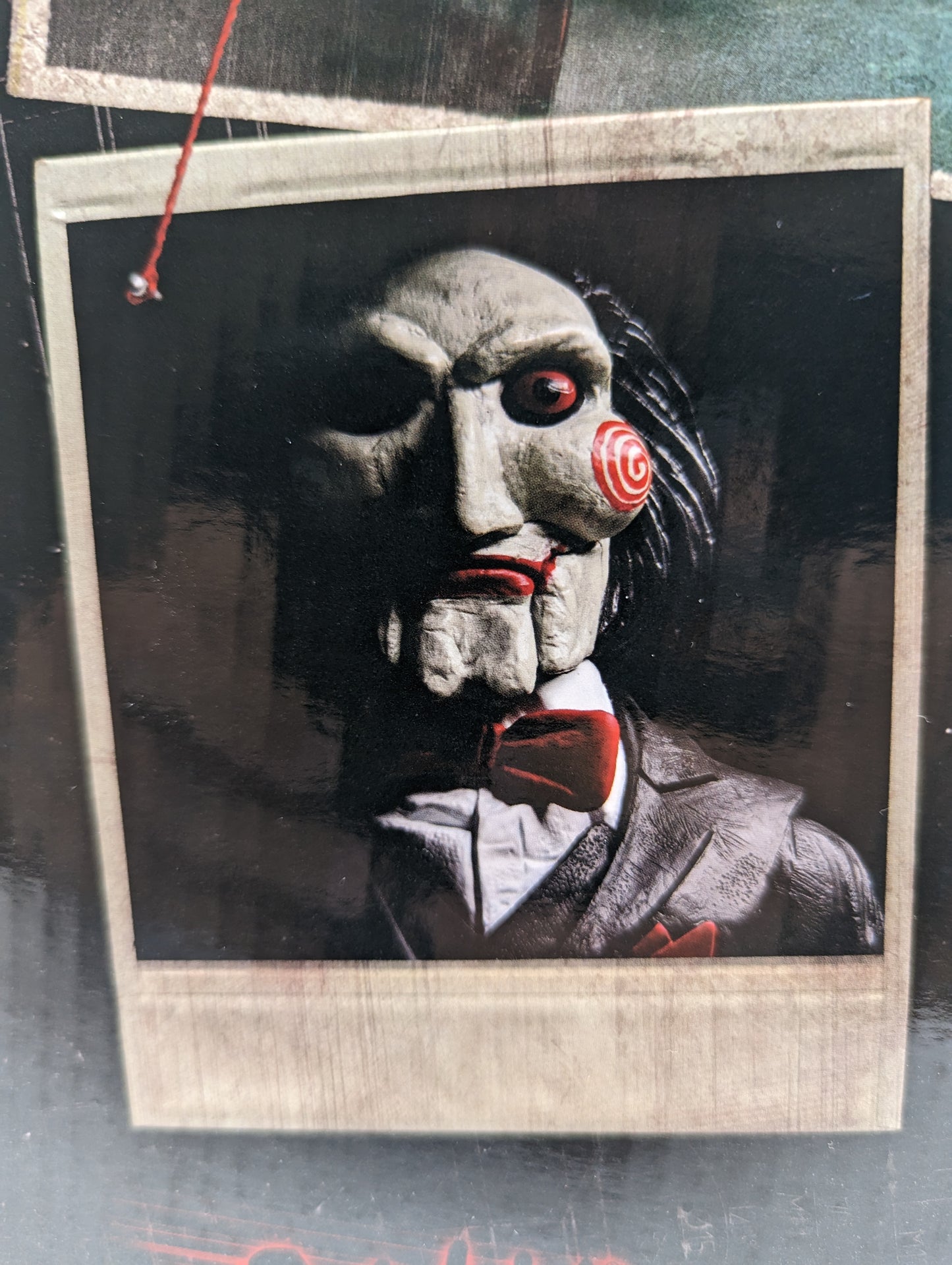 NECA - SAW Billy The Puppet with Tricycle 12 inches.