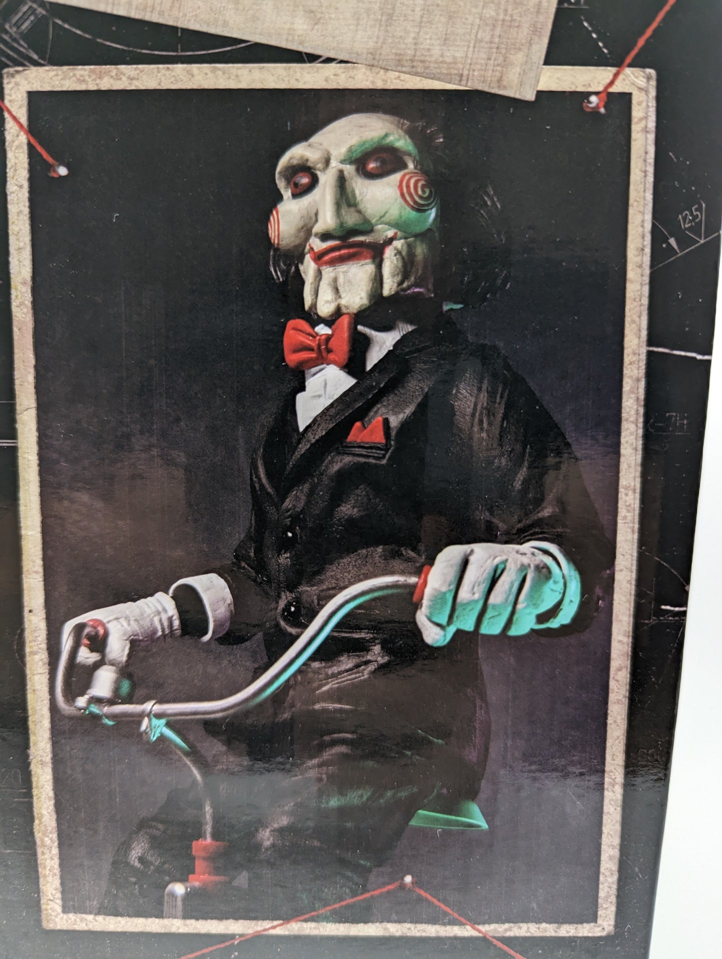 NECA - SAW Billy The Puppet with Tricycle 12 inches.